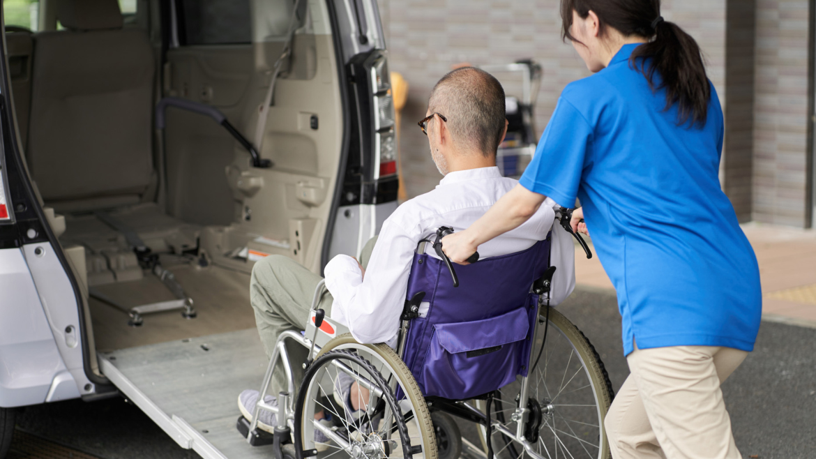 a caregiver who puts an elderly person in a long term care taxi